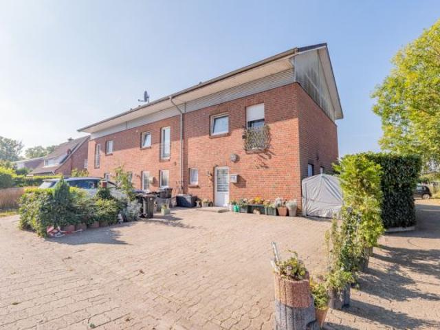 Familienfreundliches Reihenendhaus mit Garten, lichtdurchflutetem Wohnbereich und Spitzboden