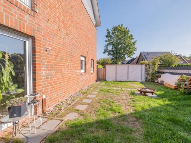 Familienfreundliches Reihenhaus mit lichtdurchfluteten Räumen und Garten