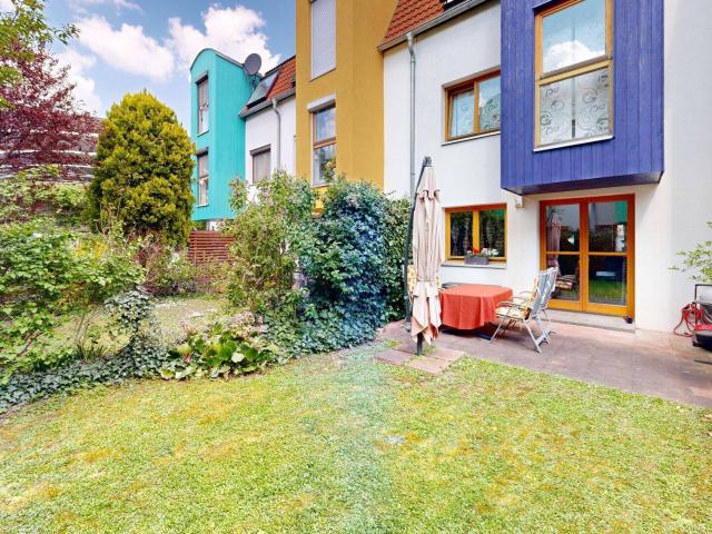 Familienfreundliches Reihenhaus mit südseitigem Garten und viel Platz in gemütlicher Siedlungslage