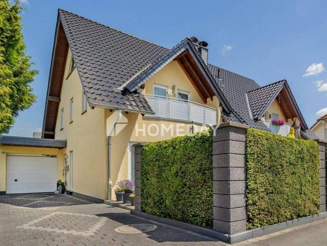 Familienleben auf drei Etagen mit sonniger Südterrasse, Loggia & Garage