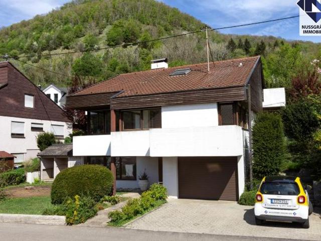 AUSSERGEWÖHNLICH Einfamilienhaus mit Einliegerwohnung, Wintergarten und großem Garten