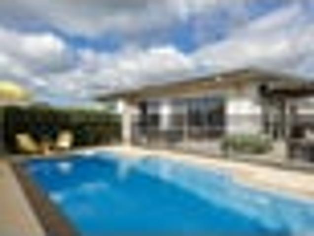 Family living, poolside days and Park Island views