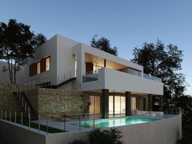 Fantástica parcela urbanizable en Elviria con un espectacular proyecto contemporáneo y licencia