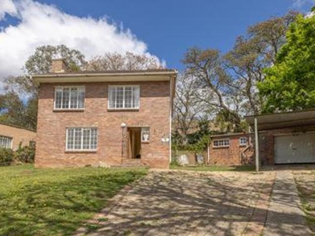 face brick double storey home with g.