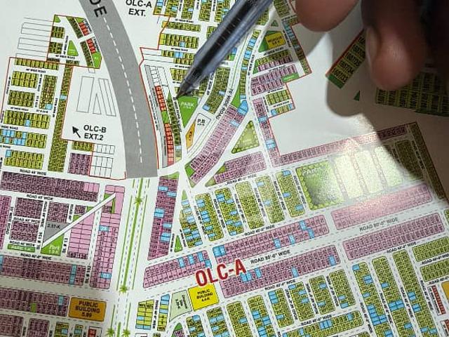 Facing park plot for sale olca block bahria orchard