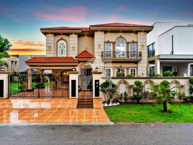 Faisal rasool designer 2 kanal 1 kanal lawn+1kanal constructed fully maintained super hot located bungalow with full basement and home theatre is available in the best block of phase 6 dha lahore