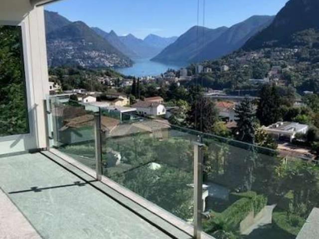 Favoloso e ampio duplex con vista sul Lago di Lugano