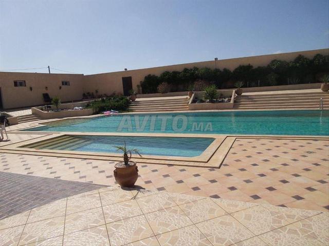 Ferme 4 hectares sur route nationale chtouka