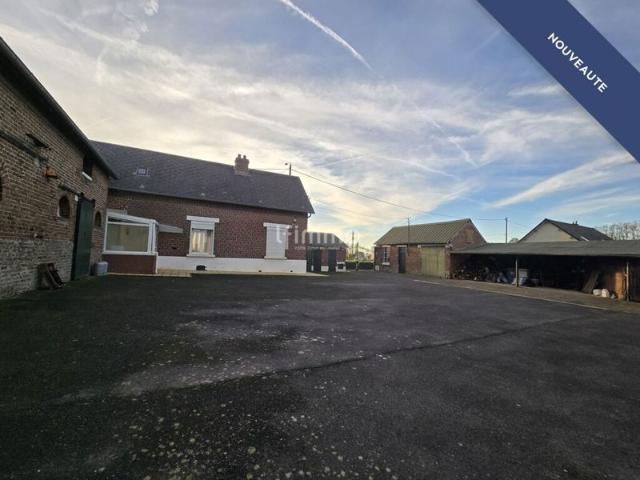 Ferme dépendances pâturage et terrain constructible
