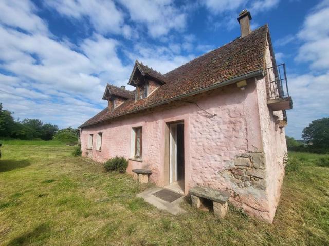 Fermette avec grange et 2,5 hectares de terrain