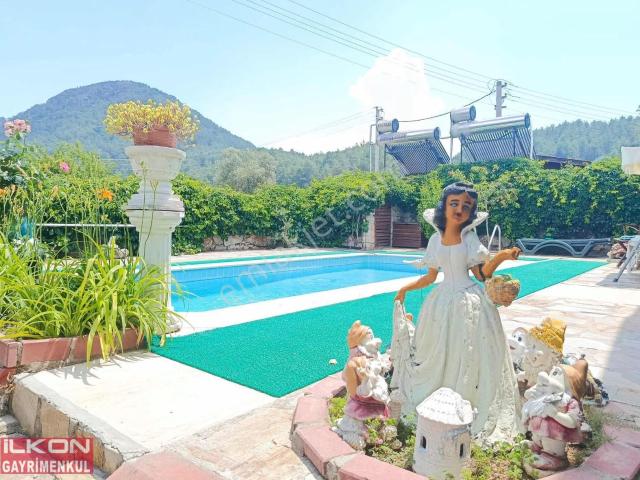 Fethiye Üzümlü Mah.de İlkon'dan Satılık Özel Tasarım Taş Villa