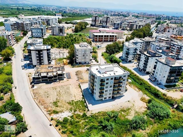 FİNİKE İSKELE'DE MODERN MİMARİLİ PROJEDEN 1+1 DAİRELER