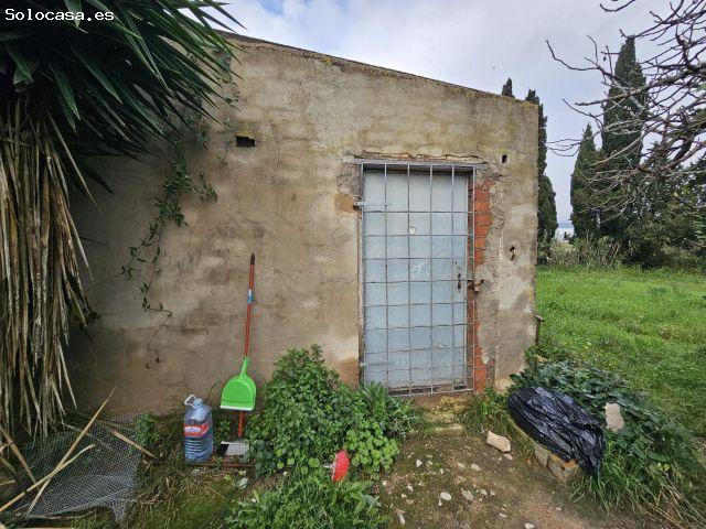 Finca con almacén de 66 m2 y agua