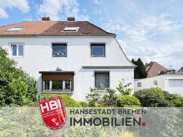 Findorff Charmante Doppelhaushälfte mit großzügigem Garten und Garage