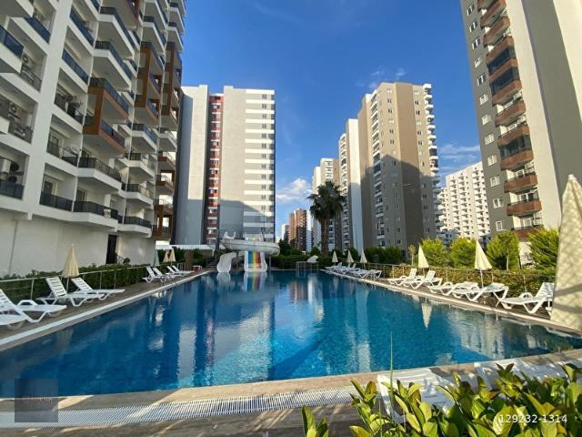 FIRSAT 1+1 ! AQUA PARKLI,BAĞIMSIZ MUTFAKLI,SAUNALI,SPOR SALONLU DAİRE