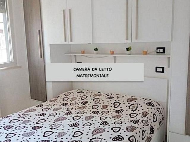 FIUMICINO BILOCALE ARREDATO Con CORTE ESTERNA