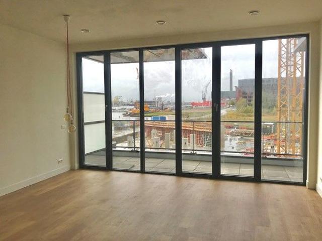 For rent: Luxurious and bright one bedroom apartment in a new 2020 building with a west facing balcony, private parking spot and a shared indoor garden!