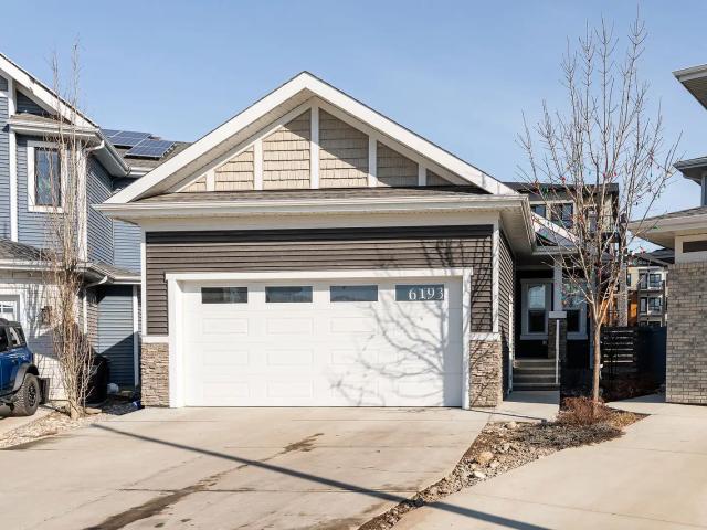 Four large Bedroom plus Den, open concept home, close to amenities