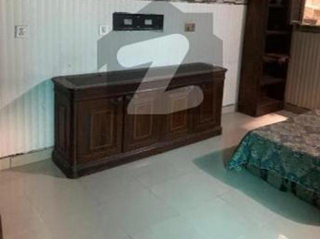 Flat For Rent Room with AC Attached bath small kitchen Almaree & Cabinets Millat Chowk