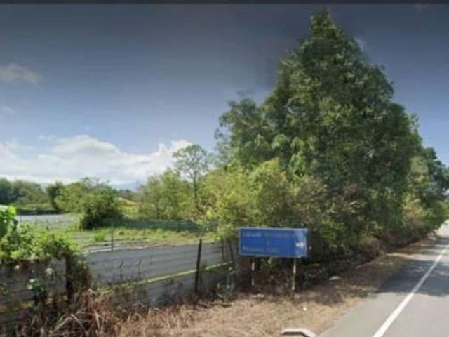 Flat land beside KL Ipoh Trunk Road near Komuter