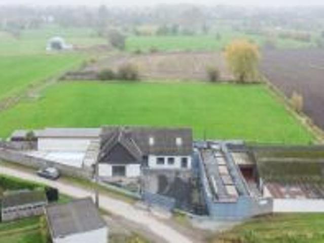 Fraaie woning met loods/magazijn op 10are te Dendermonde