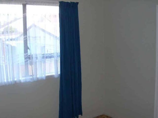 Freestanding 2 bedroom house, fenced, with garage