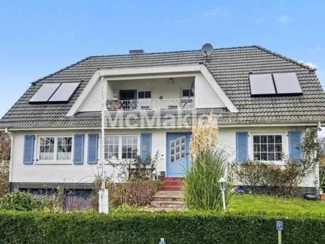 Wohnen mitten im Grünen – freistehendes Einfamilienhaus mit Sauna, Doppelgarage & Einliegerwohnung