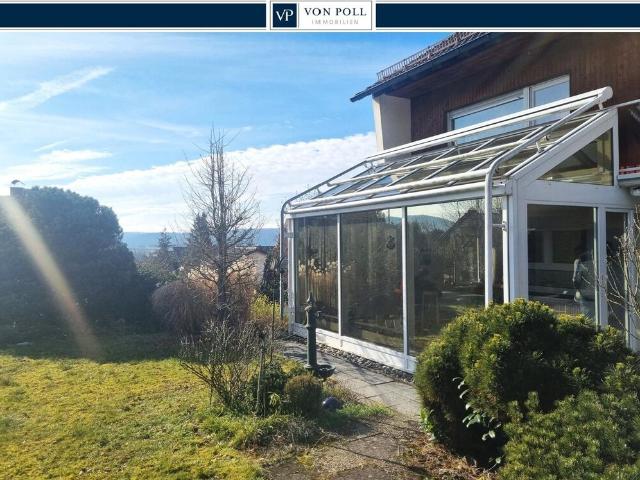 Freistehendes Einfamilienhaus: Großzügiger Rückzugsort mit Garten und Wintergarten