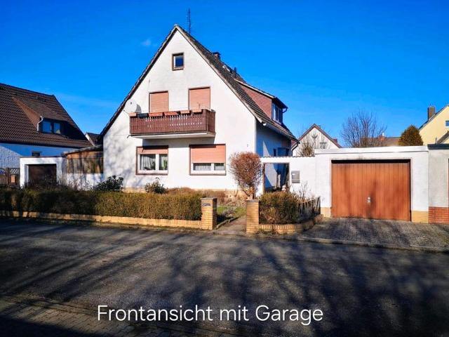 Freistehendes Einfamilienhaus mit ausbaufähiger Einliegerwohnung