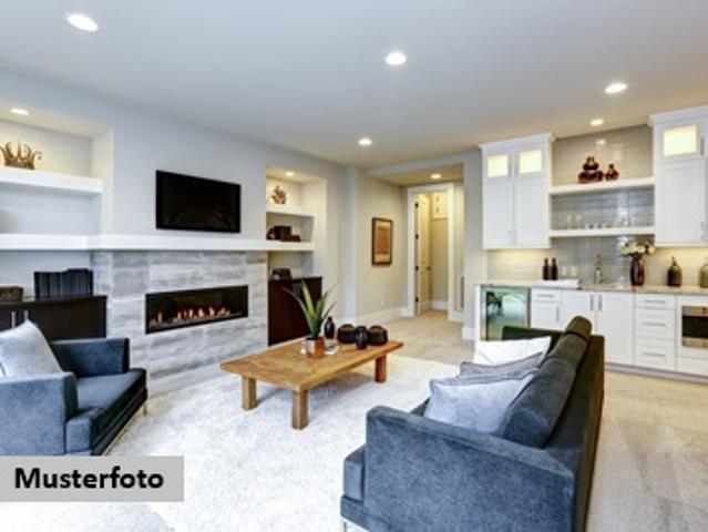 Freistehendes Einfamilienhaus mit Wohnfühloase und Garagenanbau