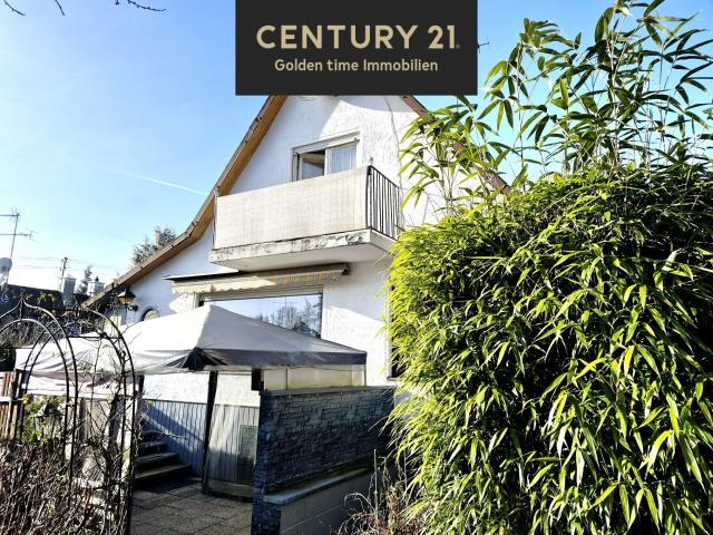 Freistehendes Einfamilienhaus mit Wintergarten und Garage