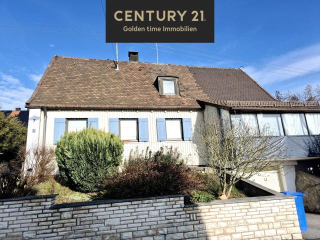 Freistehendes Einfamilienhaus mit Wintergarten und Garage
