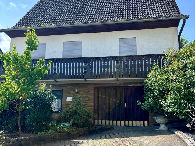 Freistehendes Einfamilienhaus mit wunderschönem Garten, Garage/Carport in ruhiger Lage von Kürten. JETZT DAS NEUE FÖRDERPROGRAMM DER KFW NUTZEN!