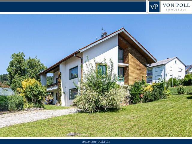 Freiraum und Vielfalt: Einfamilienhaus mit Einliegerwohnung und Garten