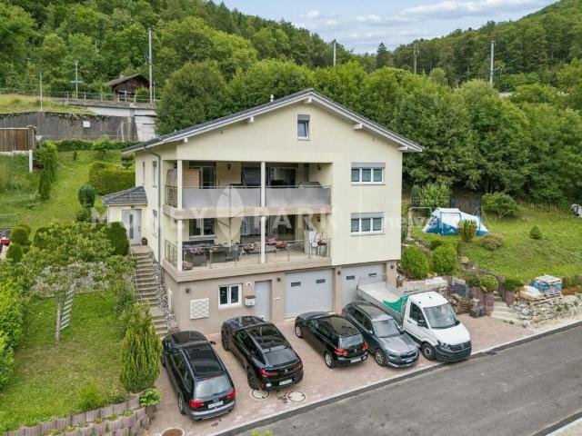 Frinvillier: Immeuble de 2 appartements de 4.5 pièces offrant de nombreuses possibilités d'aménagement et de développement