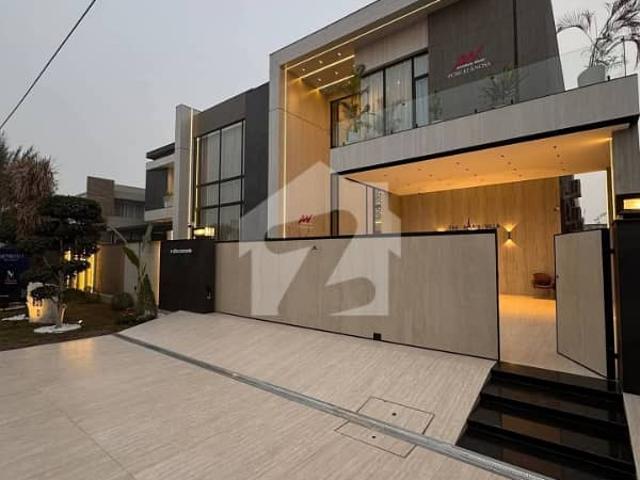Full basement fully furnished brand new 2 kanal modern design super hot located bungalow with pool, home theatre and gym is available in the best block of dha phase 6 lahore solar system also installed