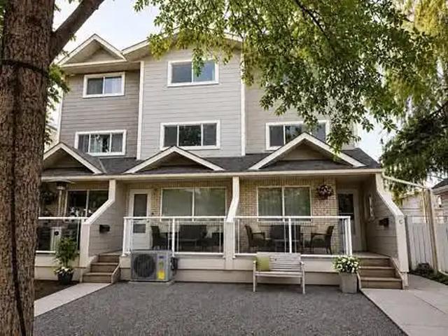Fully furnished 2000sqft home with AC and garage parking near downtown/bow river