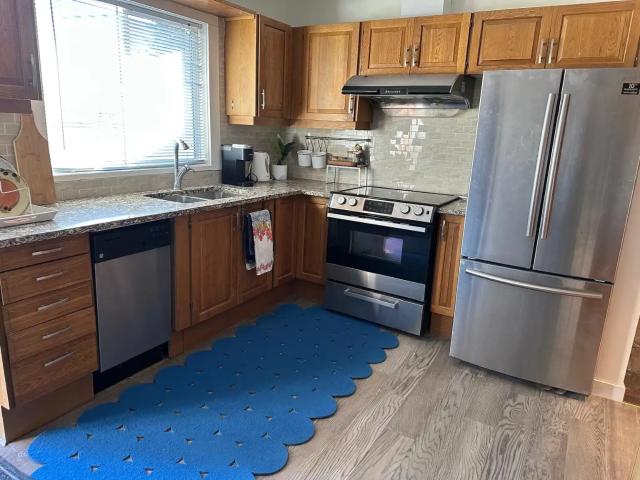 Fully Furnished 2 Bedroom Suite | Walk to 45 St C Train | Parking Included