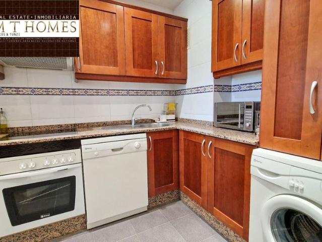 FULLY FURNISHED FRONTLINE GOLF APARTMENT WITH LARGE TERRACE BEAUTIFUL VIEWS POOL AND A GARAGE