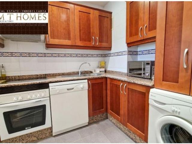 FULLY FURNISHED FRONTLINE GOLF APARTMENT WITH LARGE TERRACE POOL AND A GARAGE