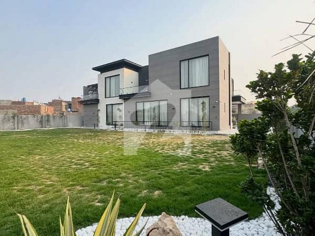 Fully furnished modern 2 kanal 1+ super hot located bungalow with pool and theatre is available in the best block of dha phase 6 lahore