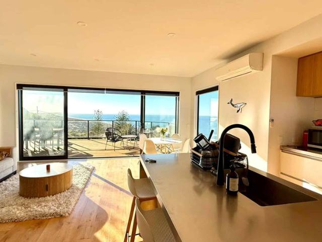 FULLY FURNISHED STUNNING FAMILY HOME WITH OCEAN VIEWS!