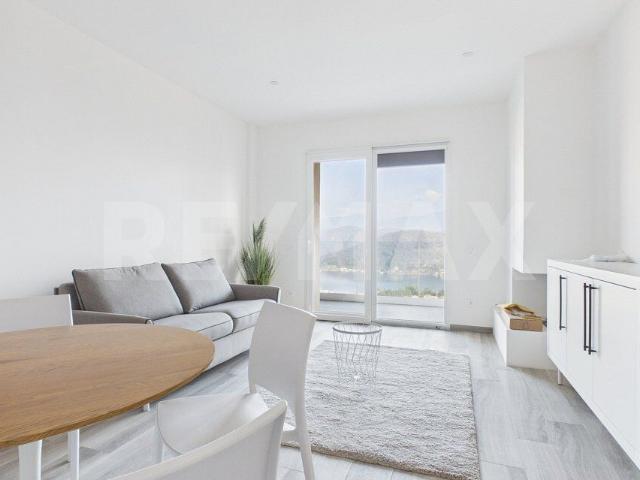 Furnished apartment with 3.5 rooms on sale in Ponte Tresa 90 m² | dreamo. Ch