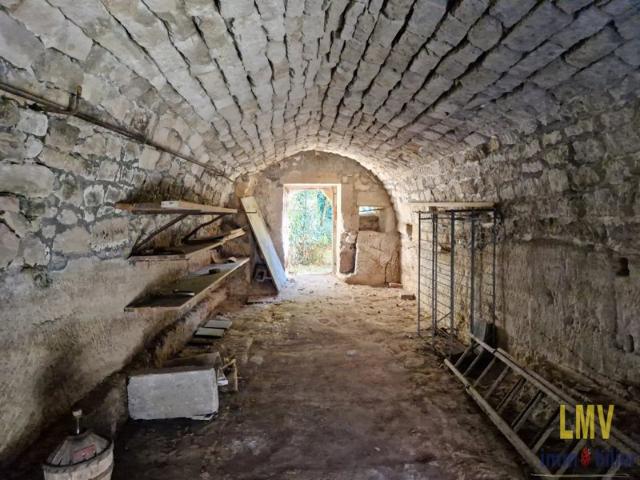 Garage/ Cave et terrain à bâtir
