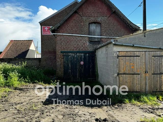 Garages et terrain constructible