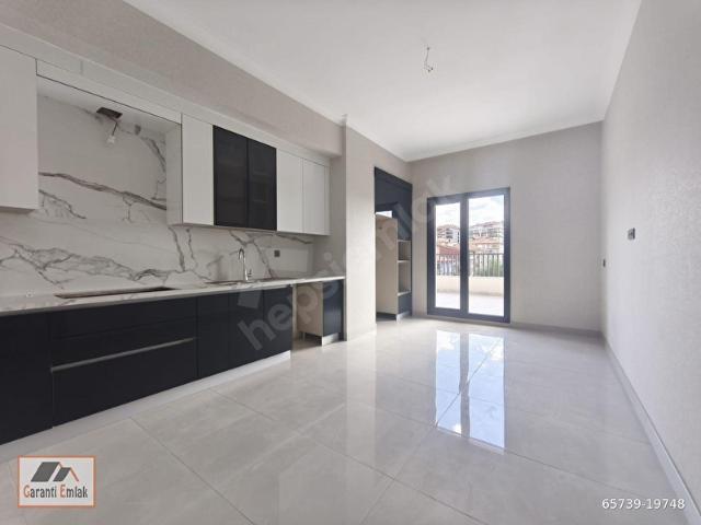 GARANTİ EMLAK'TAN SATILIK SIFIR 4+1 TERAS BALKONLU SİTE DAİRESİ