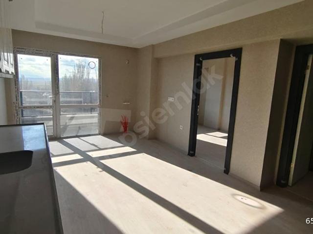GARANTİ EMLAK'TAN ÇUBUK DUMLUPINAR'DA SATILIK 1+1 ARA KAT DAİRE