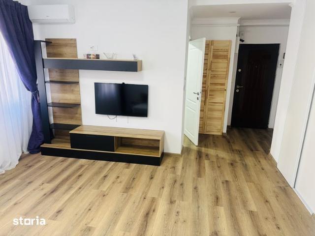 Garsoniera regim hotelier ultracentral Ploiesti Piata Victoriei modern