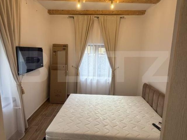 Garsoniera 28 mp, prima inchiriere, singur in curte cu terasa