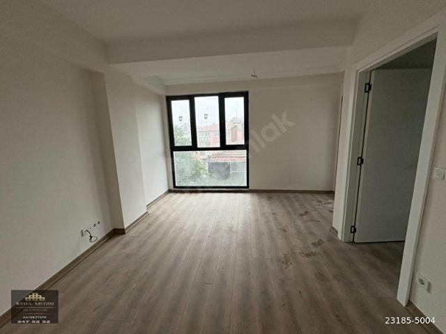 GAYRETTEPE SIFIR BİNA ARAKAT KOMBİLİ BALKONLU 1+1 60m